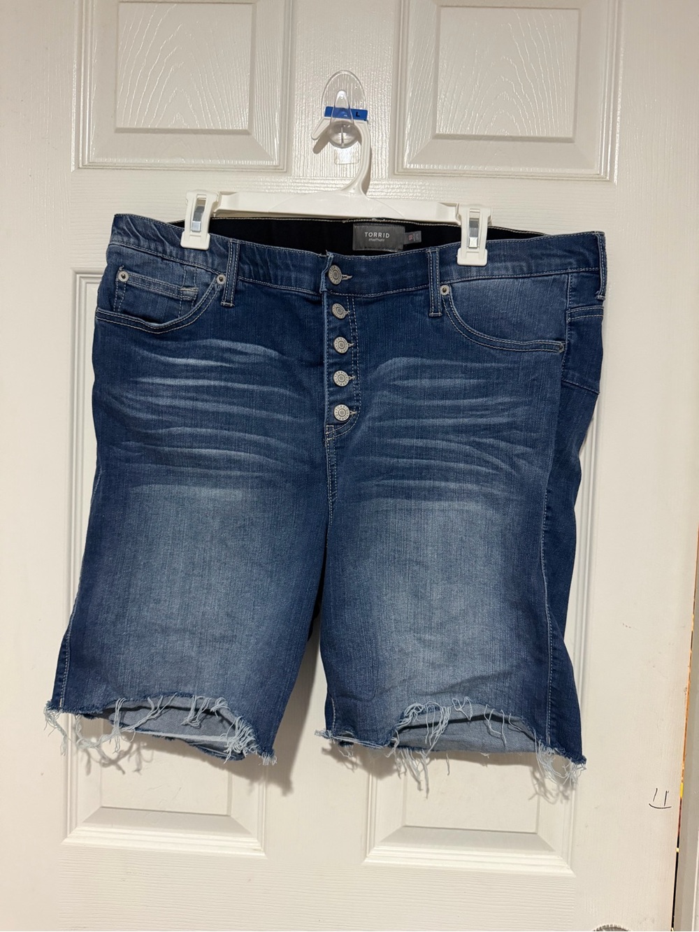 torrid dark blue distressed denim bermuda shorts